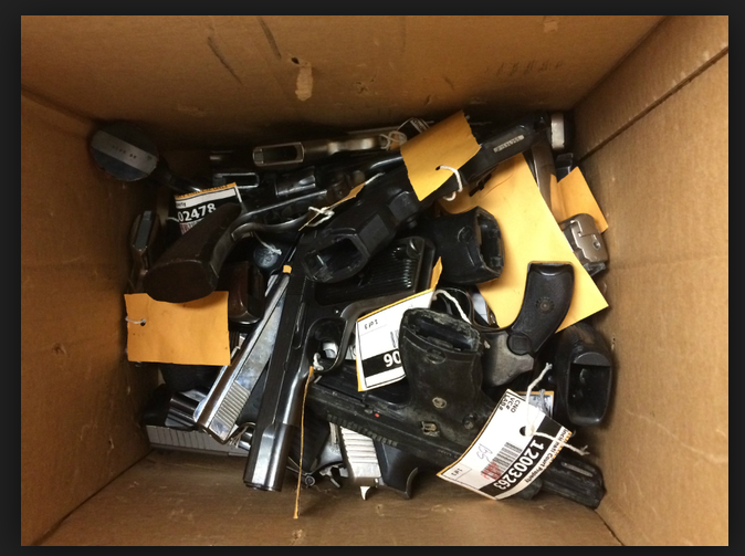 Worker finds unsecured box of guns, evidence in trash at Harris County courthouse