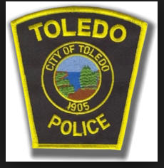 Toledo police investigating retired officer related to missing firearm